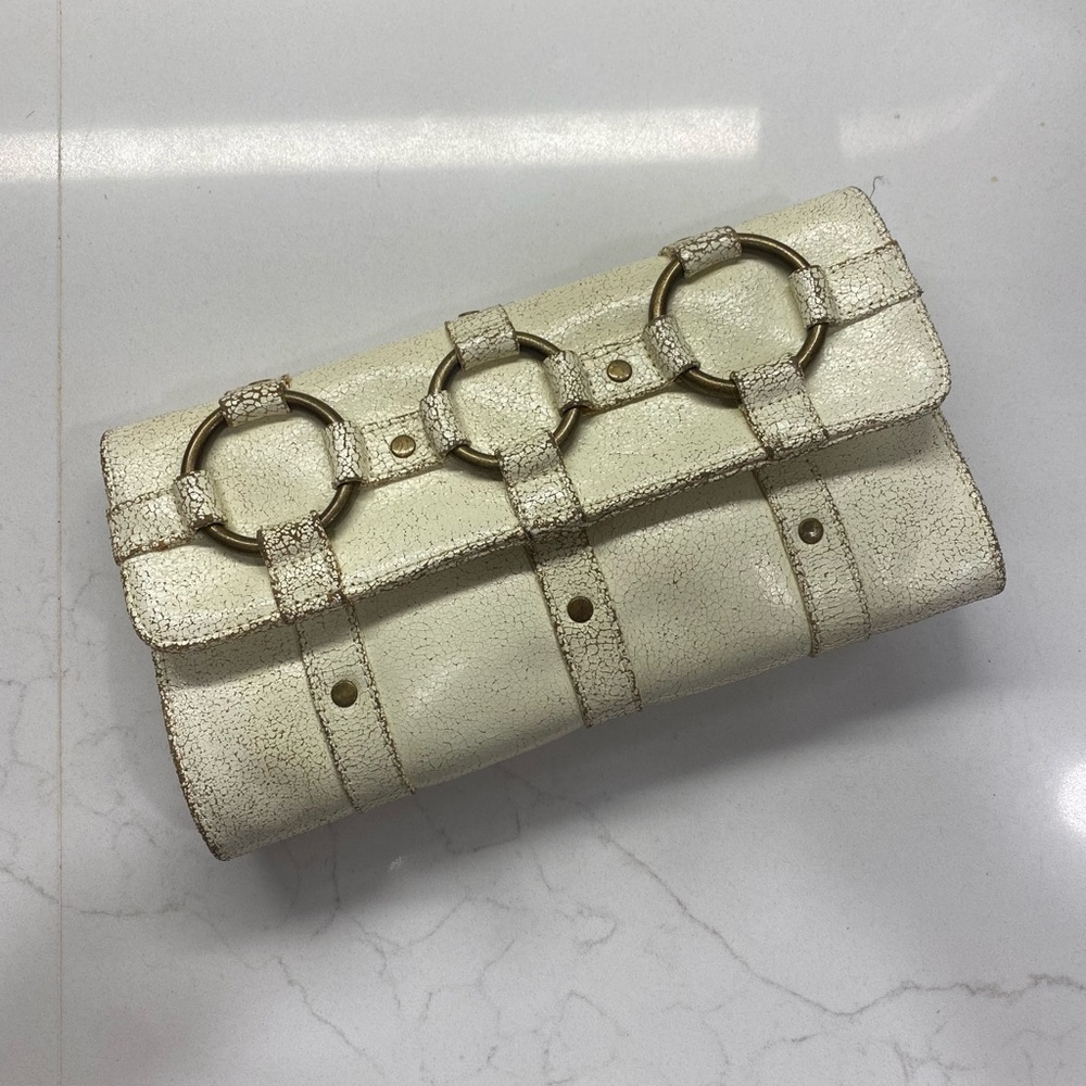 Jasmine distressed cream leather clutch
